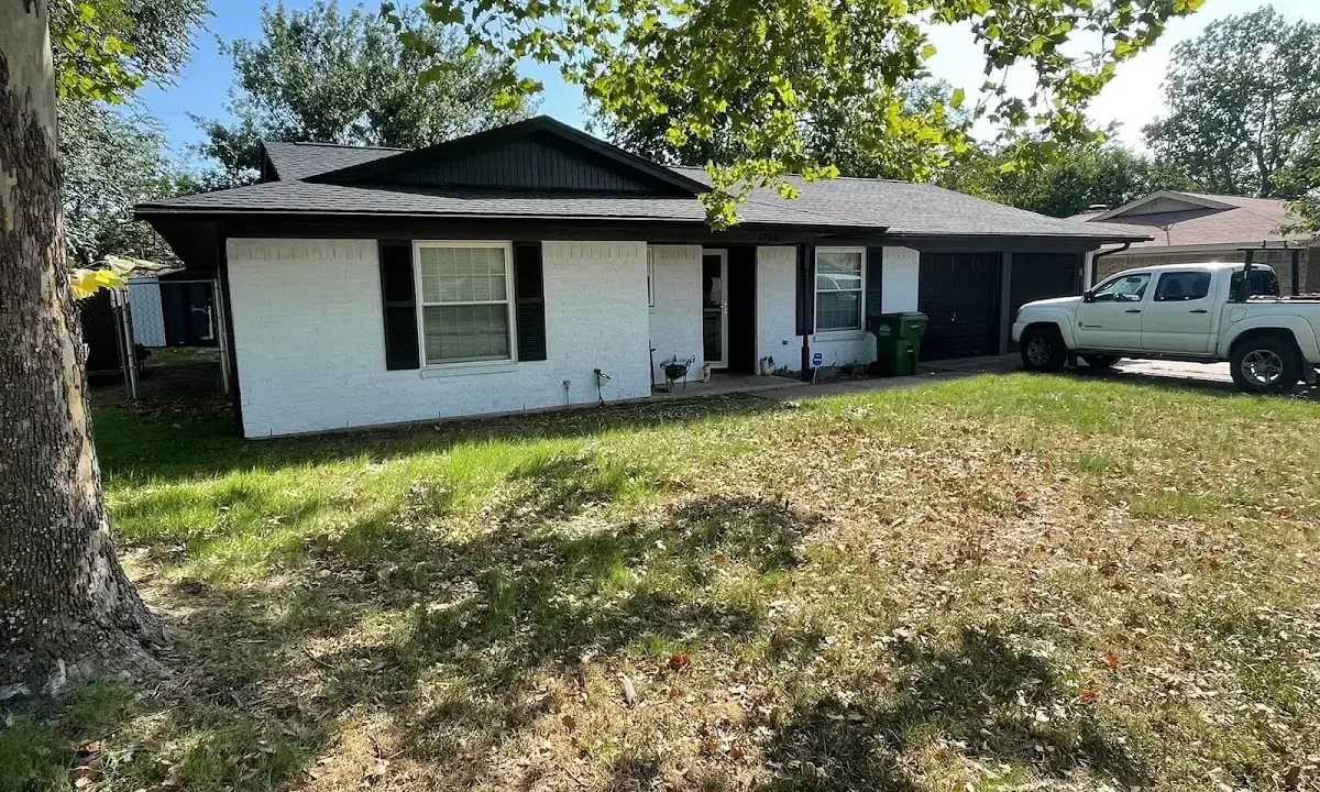 Professional roofing crew working on a residential roof in Villa Park